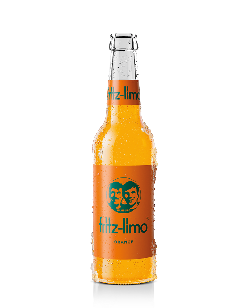 fritz-limo orange mit orangem etikett und kondenswasser und eis an der glasflasche